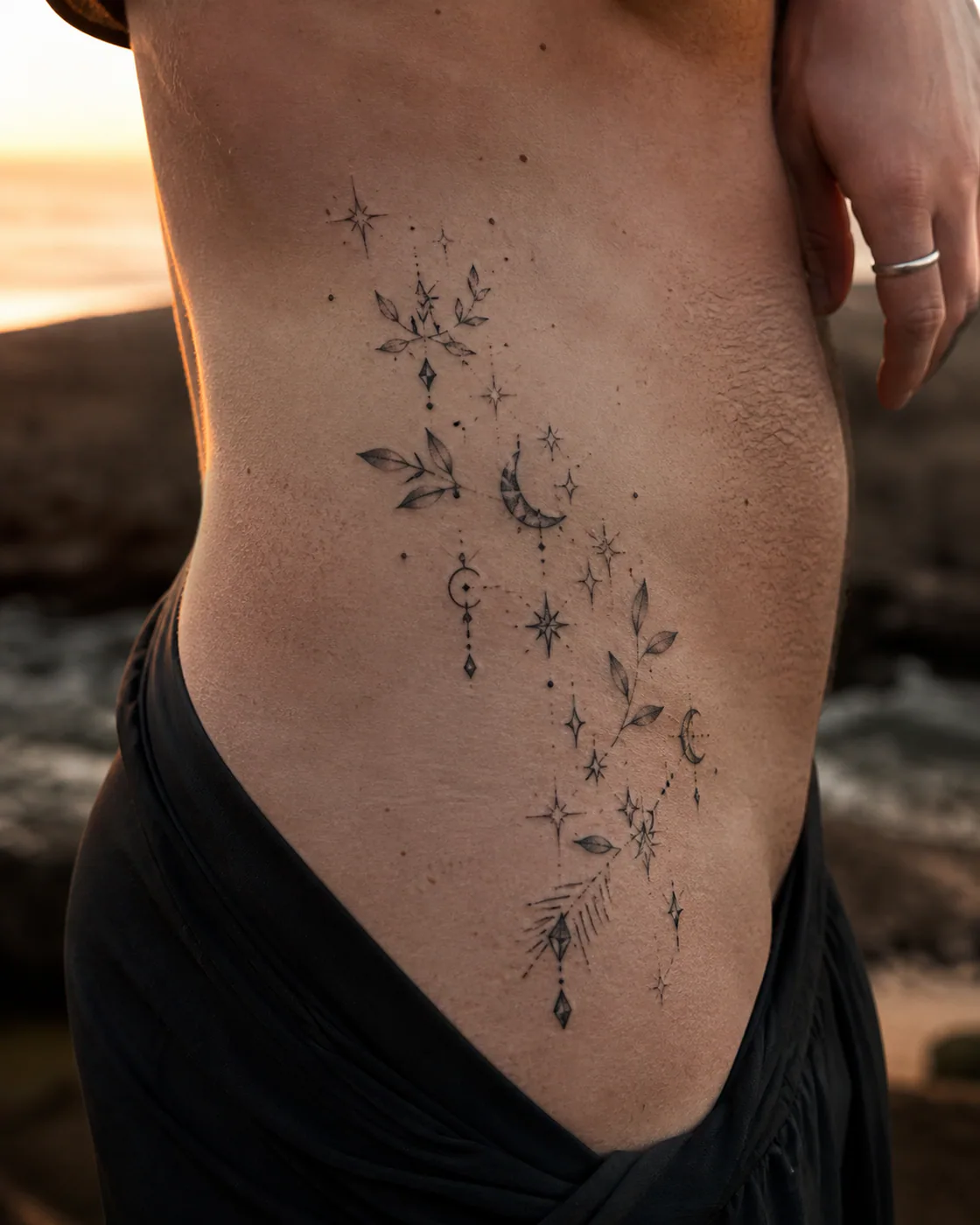 Black And Grey Filler tattoo on the Hip