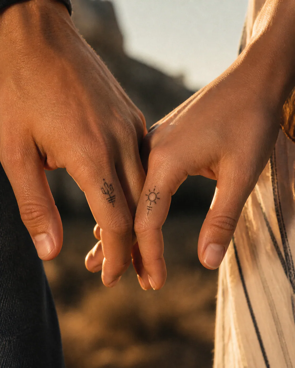 Geometric Couple Western tattoo on the Finger