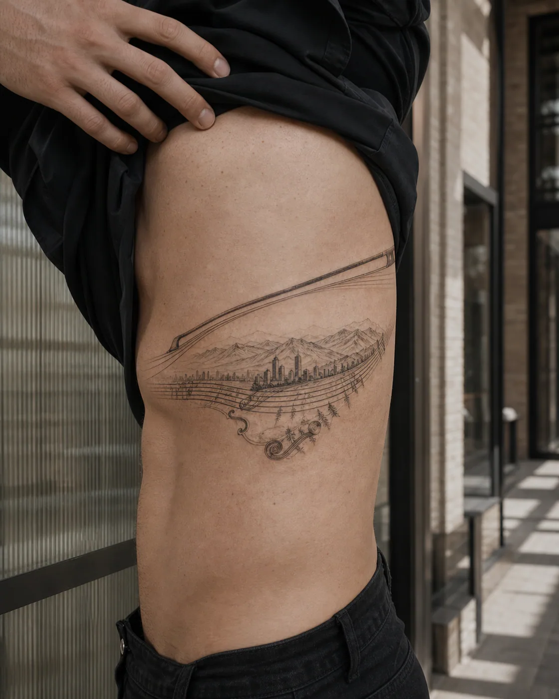 Illustrative tattoo of a violin bow drawing a horizon across layered strings on the side ribs