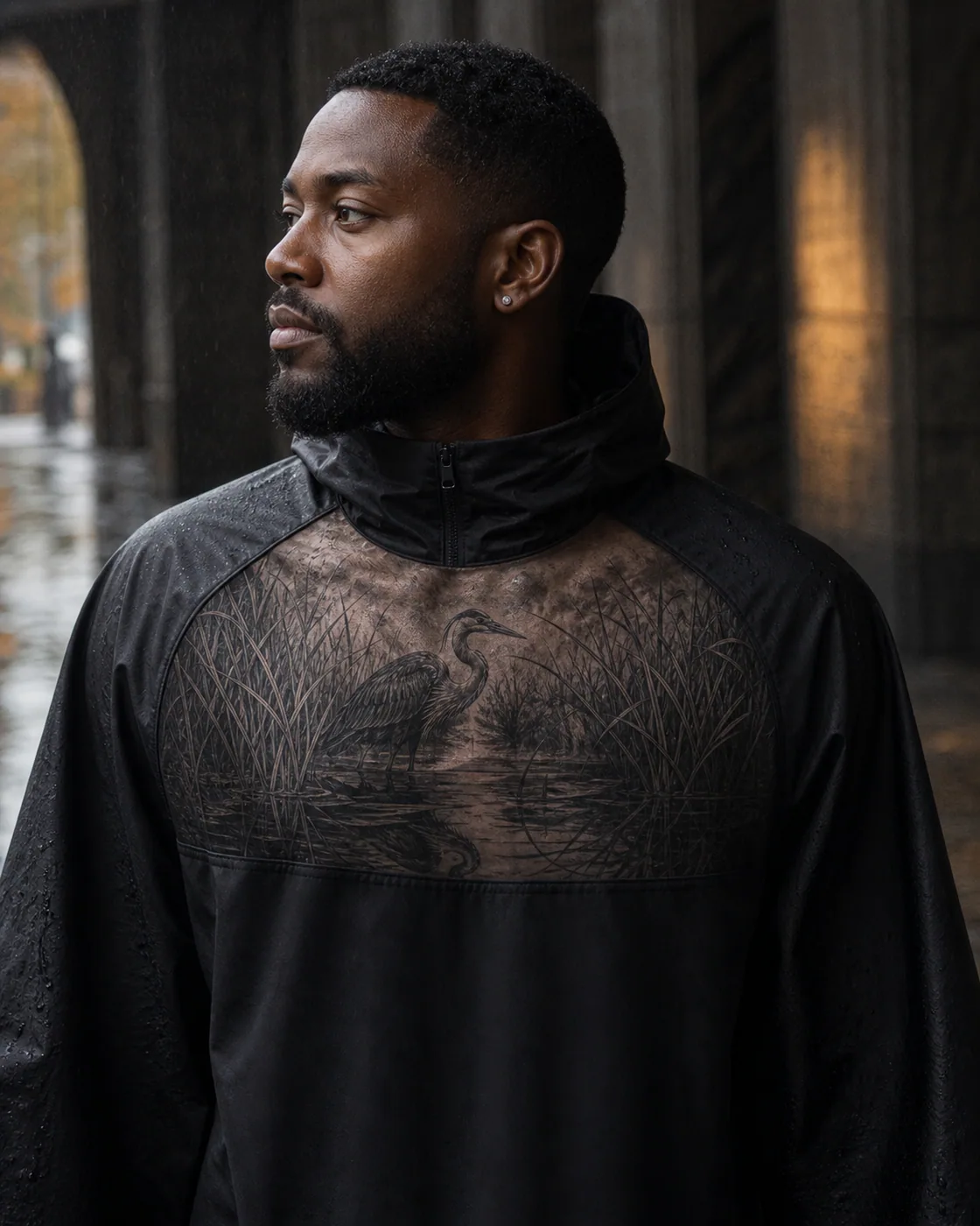 Black and Gray tattoo of a heron wading through mirrored marsh grasses executed as a healed cover-up on the chest