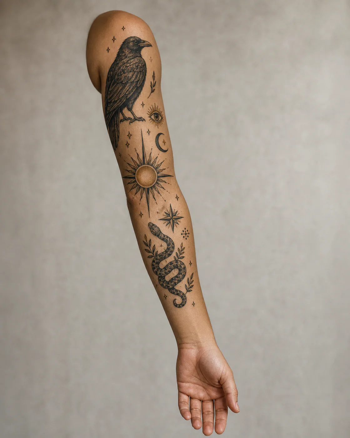 Patchwork sleeve tattoo planning example on olive skin with three large anchors, medium symbols, tiny fillers, protected wrist space, and varied gaps around the arm